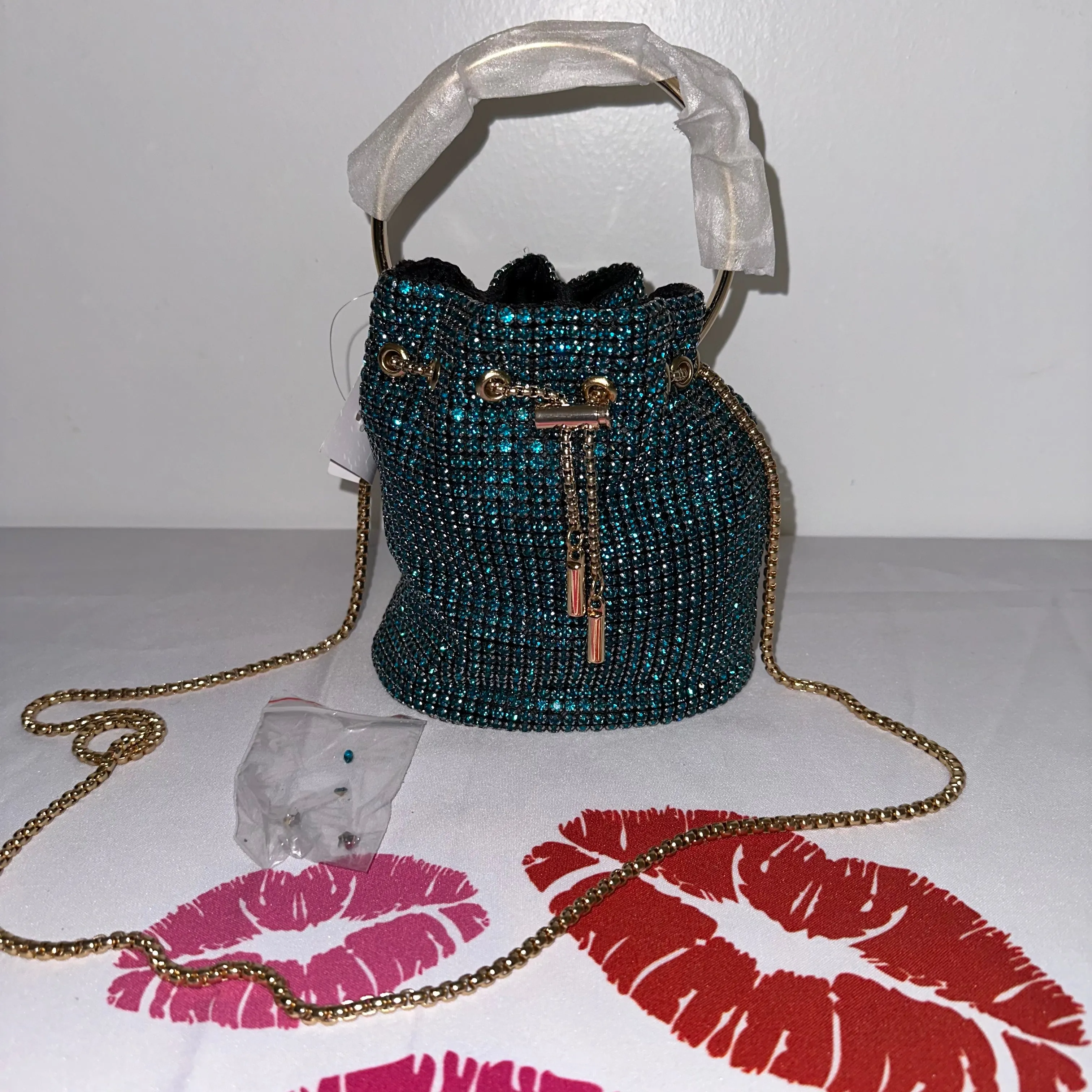 Iconic Glam Peacock Blue Bucket Bag