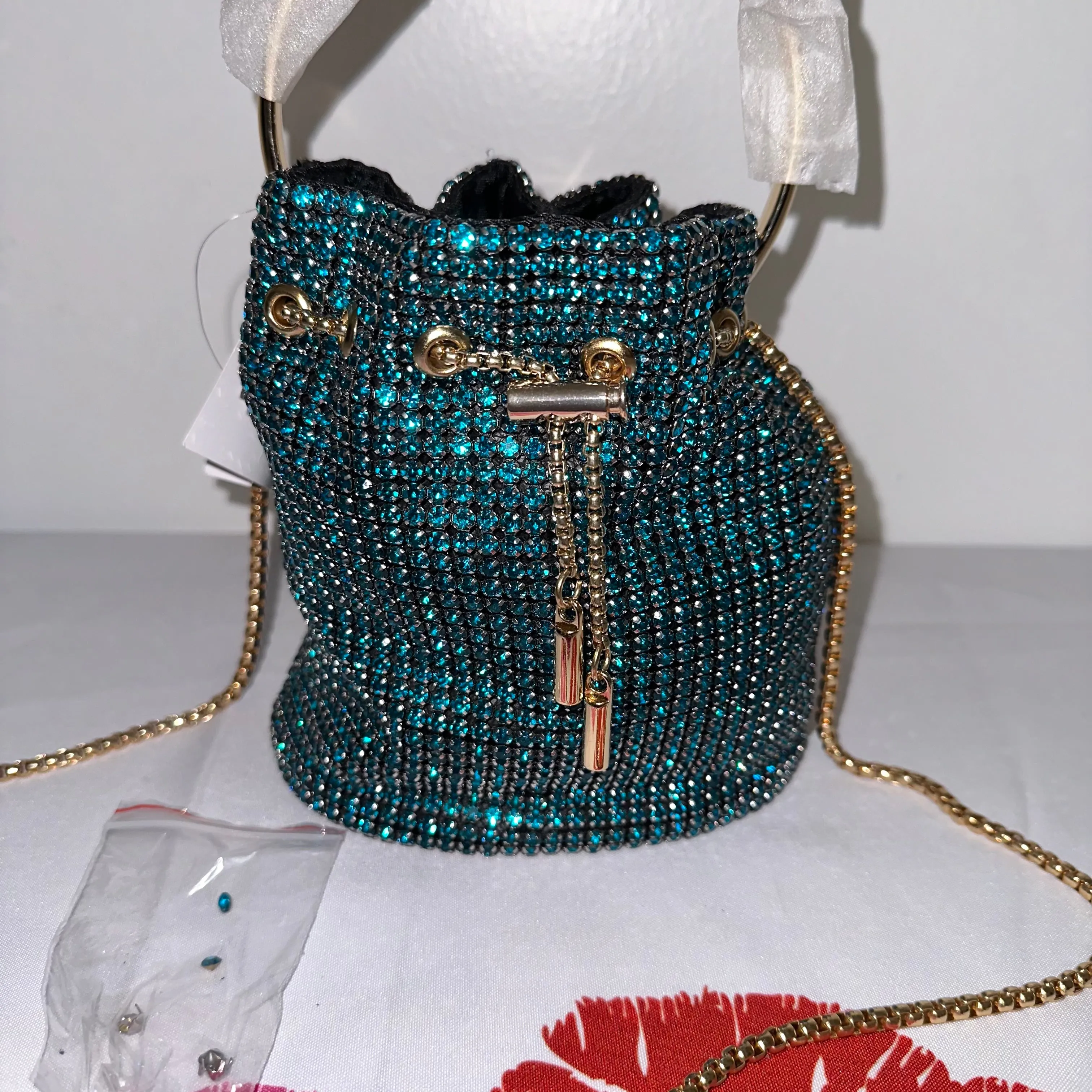 Iconic Glam Peacock Blue Bucket Bag